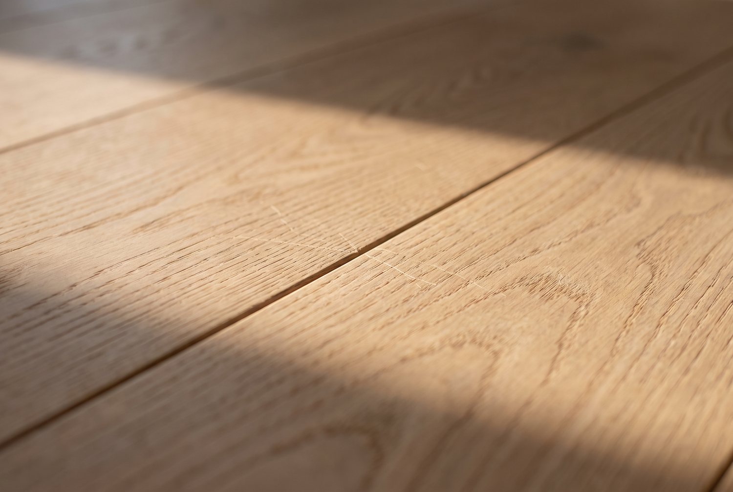 Wide plank white oak hardwood flooring detail
